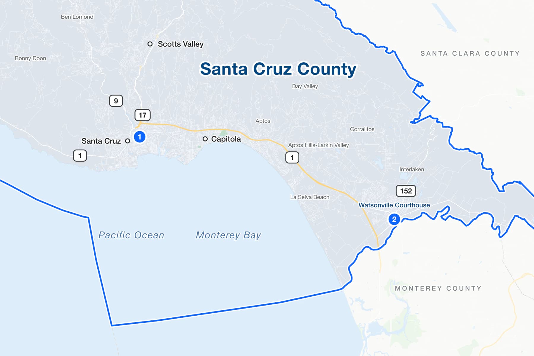 Map of Santa Cruz County, California, with numbered pins at the courthouses in Santa Cruz and Watsonville.